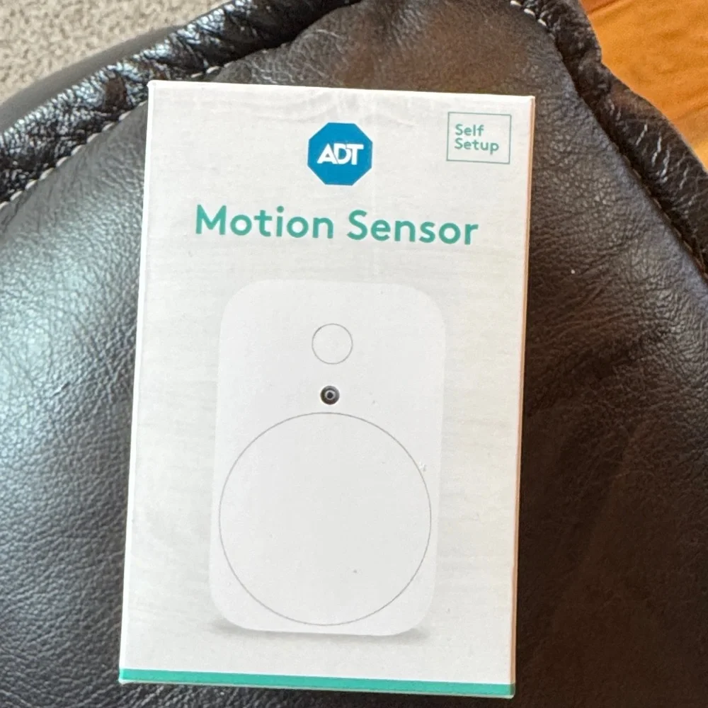 ADT White Motion Sensor with Teal Accents